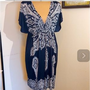 Low V neck mini dress. Blue and white, size small. Pre-owned good cond.
